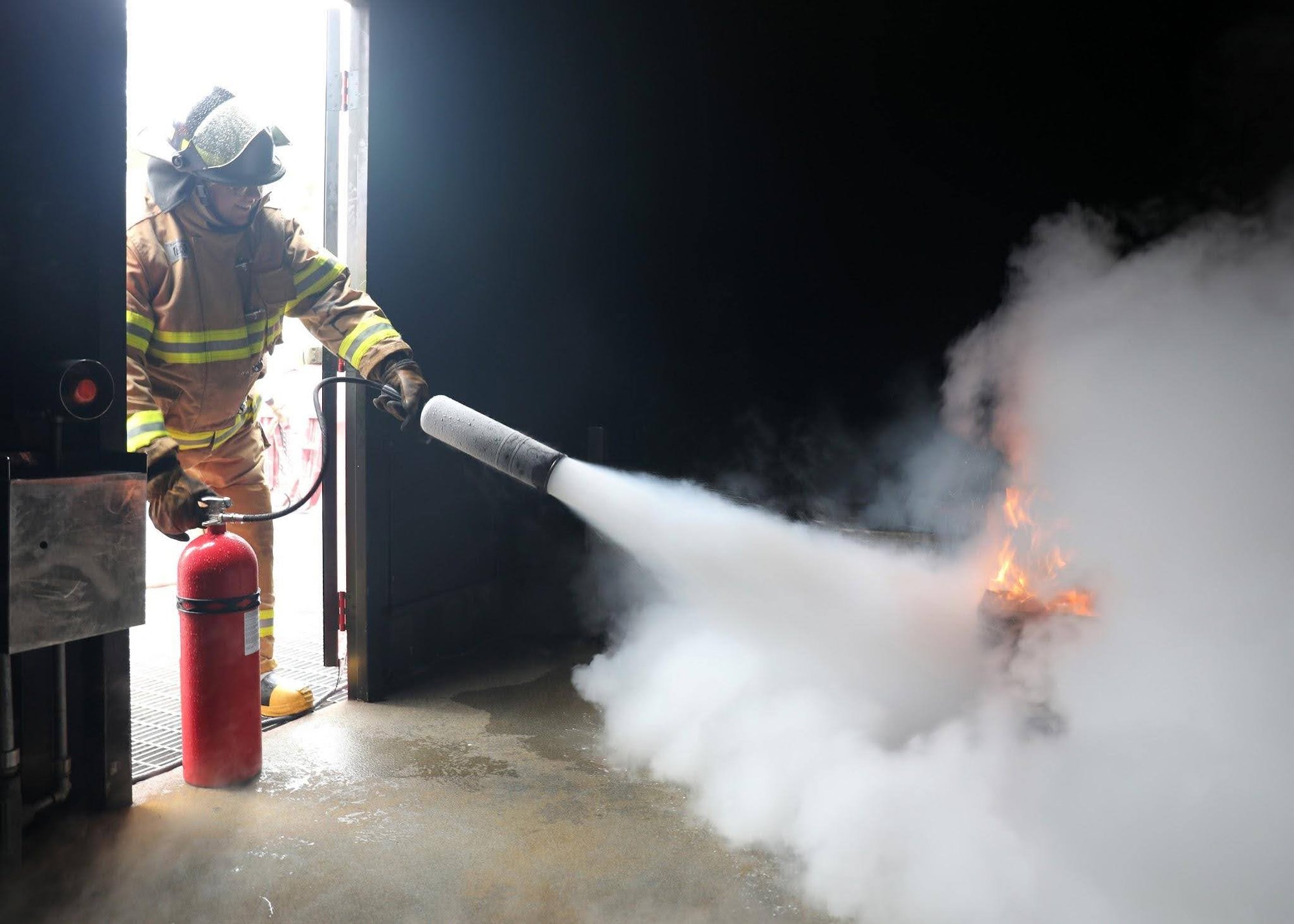 firefighter extinguishing a fire